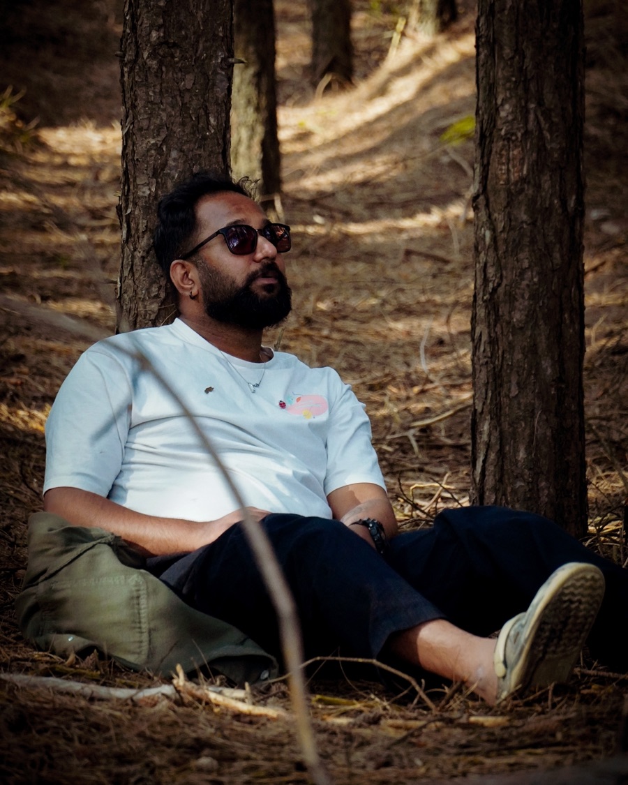 Varnan relaxing in a pine forest while travelling